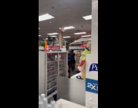 Kid riding citibike inside CVS pharmacy