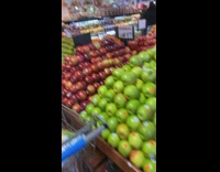 Green alien costume mask guy grocery store 
