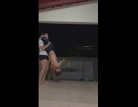 Guy and girl do acrobatic couple poses