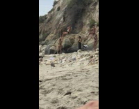 Double photo shoot beach rocks dance black dress