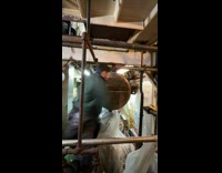 Time lapse of man that cleans the holes of the pipe