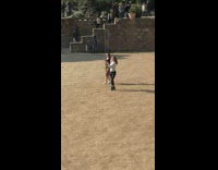 Two women tiktok dance in the middle of the park