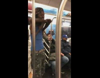 Skinny double jointed guy blue shirt bends arms backwards on subway train