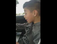 Older sister pranks little brother by changing his laptop background to her selfie