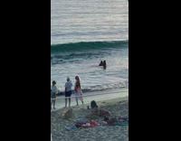 Girl hat bikini roll on sand beach