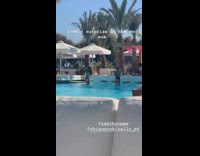 Girl falls in pool while taking photo at resort
