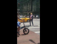 Man Donald Trump mask manage traffic street