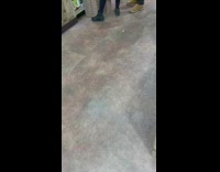 Guy rides rollerblades inside grocery store 