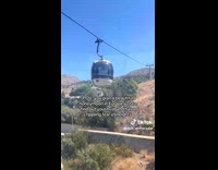 Man with fear of heights in cable car