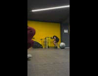 Girl kicks yoga ball hits guy on face 