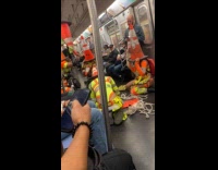 Traffic cone heads hitting cones on subway floor 
