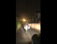 Guy carries passed out friend over shoulders