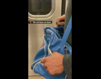 Fly bee crawls on hand guy subway 