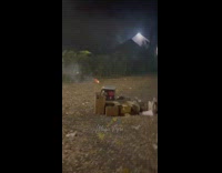 Man Lights Set of Display Fireworks on Vacant Lot