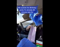 Guy puts together gift bag in car 