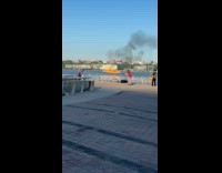 Collab WINY - Two men shoot flamethrower at each other