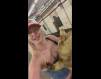 Woman with a taxidermy dog on the subway