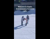 Man cable car snow mountain woman bikini