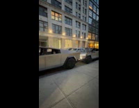 Parked Cybertrucks lights flicker play music