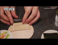 Girl makes miniature tiny sushi rice candle