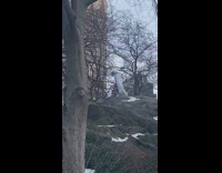 Guy covered in red paint poses pt. 2