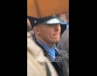 Woman wearing orange beard ignored by fiance 