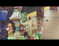 Guy American flag hat dancing dolls music accordion 