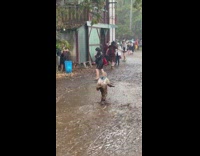 Little kid playing in middle of mud puddle pt 2