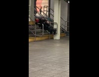 Red costume mask guy push ups railing 