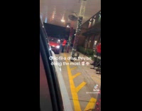 Band of Busker Plays Christmas Carol at Drive Thru