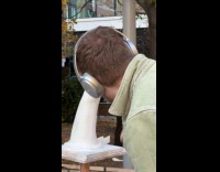 Man hand carving on street public session