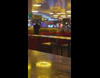 Woman climbs on sofa chairs casino picture