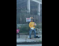 Yellow shirt guy do not vote sign