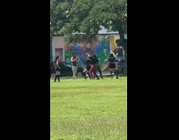 Collab IITW - Girl dance group black shirt park mural