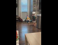 Baby bucket on head walking