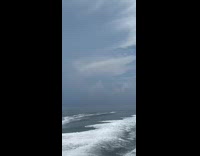 Guy holding onto yellow float flips over 