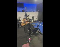 One woman giving piggyback ride to friend falls at gym