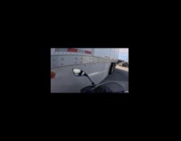 Truck almost hit motorbike turning on stoplight