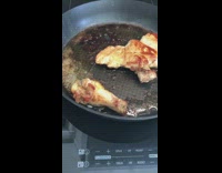 Chicken leg moves as it gets fried