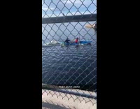 Two guys blue kayak sink fail 