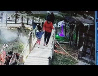 Mother and child gets scared by the animatronic alligator head