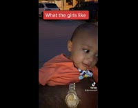 Little boy moves tongue around in response 