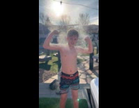 Kid steam from his body at backyard