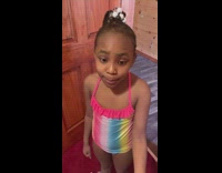 Little girl jumps in deep end of pool