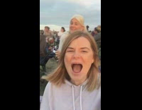 Girl lip syncs frozen guy eats chips