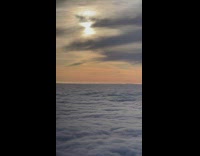 Sea of clouds plane view eerie music