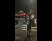 Pennywise clown and georgie give out balloons