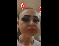 Girl with devil filter tries food cooking on stove 