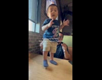 Couple doing best not to raise iPad kid