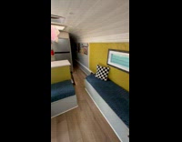 Collab PubityPets - Lady Tours Transformed Bus into Cozy Home